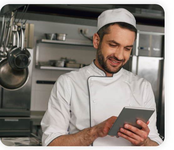 Chef using Modisoft app on the tablet.