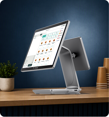 Modisoft M26 POS terminal displaying a touchscreen point of sale interface on a countertop.